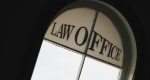 Arched law office window sign