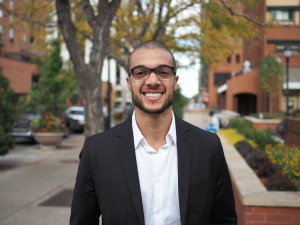 Smiling professional in suit jacket outdoors